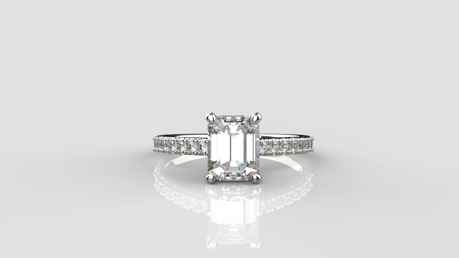 Emerald Cut Moissanite Solitaire Ring with small Moissanites on the shank in 9ct White Gold