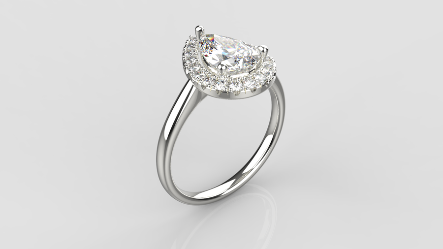 Pear Cut Moissanite Solitaire Ring with small Moissanites on the shank in 9ct WhiteGold