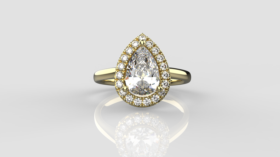 Pear Cut Moissanite Solitaire Ring with small Moissanites on the shank in 9ct Yellow Gold